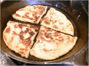 Frying potato farls, from http://howtofood.net/2011/11/07/farls-irish-potato-bread/